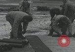 Image of American soldiers packing mortars England United Kingdom, 1944, second 15 stock footage video 65675080774