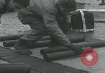 Image of American soldiers packing mortars England United Kingdom, 1944, second 26 stock footage video 65675080774