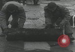 Image of American soldiers packing mortars England United Kingdom, 1944, second 35 stock footage video 65675080774