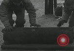 Image of American soldiers packing mortars England United Kingdom, 1944, second 37 stock footage video 65675080774