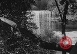 Image of Minnehaha Falls family visit Minneapolis Minnesota USA, 1918, second 21 stock footage video 65675080789