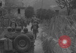 Image of American soldiers walking through Querceta Italy Querceta Italy, 1945, second 4 stock footage video 65675080794