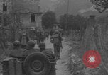 Image of American soldiers walking through Querceta Italy Querceta Italy, 1945, second 6 stock footage video 65675080794
