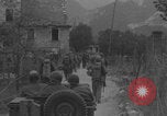 Image of American soldiers walking through Querceta Italy Querceta Italy, 1945, second 8 stock footage video 65675080794