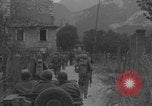 Image of American soldiers walking through Querceta Italy Querceta Italy, 1945, second 9 stock footage video 65675080794
