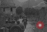Image of American soldiers walking through Querceta Italy Querceta Italy, 1945, second 10 stock footage video 65675080794