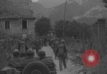 Image of American soldiers walking through Querceta Italy Querceta Italy, 1945, second 11 stock footage video 65675080794