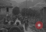 Image of American soldiers walking through Querceta Italy Querceta Italy, 1945, second 13 stock footage video 65675080794
