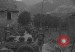 Image of American soldiers walking through Querceta Italy Querceta Italy, 1945, second 15 stock footage video 65675080794