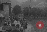 Image of American soldiers walking through Querceta Italy Querceta Italy, 1945, second 22 stock footage video 65675080794