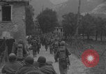 Image of American soldiers walking through Querceta Italy Querceta Italy, 1945, second 24 stock footage video 65675080794