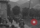 Image of American soldiers walking through Querceta Italy Querceta Italy, 1945, second 26 stock footage video 65675080794