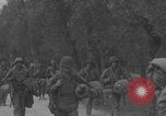 Image of American soldiers walking through Querceta Italy Querceta Italy, 1945, second 35 stock footage video 65675080794