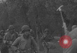 Image of American soldiers walking through Querceta Italy Querceta Italy, 1945, second 42 stock footage video 65675080794
