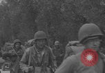 Image of American soldiers walking through Querceta Italy Querceta Italy, 1945, second 44 stock footage video 65675080794