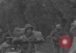 Image of American soldiers walking through Querceta Italy Querceta Italy, 1945, second 46 stock footage video 65675080794