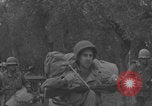 Image of American soldiers walking through Querceta Italy Querceta Italy, 1945, second 47 stock footage video 65675080794