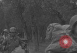 Image of American soldiers walking through Querceta Italy Querceta Italy, 1945, second 48 stock footage video 65675080794