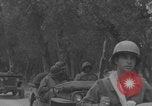 Image of American soldiers walking through Querceta Italy Querceta Italy, 1945, second 52 stock footage video 65675080794