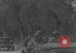 Image of American soldiers walking through Querceta Italy Querceta Italy, 1945, second 53 stock footage video 65675080794
