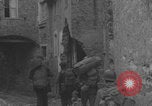 Image of American soldiers walking through Querceta Italy Querceta Italy, 1945, second 54 stock footage video 65675080794