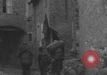 Image of American soldiers walking through Querceta Italy Querceta Italy, 1945, second 55 stock footage video 65675080794