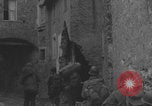 Image of American soldiers walking through Querceta Italy Querceta Italy, 1945, second 56 stock footage video 65675080794