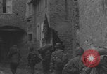 Image of American soldiers walking through Querceta Italy Querceta Italy, 1945, second 57 stock footage video 65675080794
