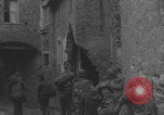 Image of American soldiers walking through Querceta Italy Querceta Italy, 1945, second 58 stock footage video 65675080794