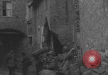 Image of American soldiers walking through Querceta Italy Querceta Italy, 1945, second 59 stock footage video 65675080794