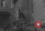 Image of American soldiers walking through Querceta Italy Querceta Italy, 1945, second 60 stock footage video 65675080794