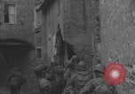 Image of American soldiers walking through Querceta Italy Querceta Italy, 1945, second 61 stock footage video 65675080794