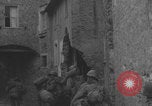 Image of American soldiers walking through Querceta Italy Querceta Italy, 1945, second 62 stock footage video 65675080794