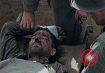 Image of Injured and deceased Marines WW2 Iwo Jima Japan, 1945, second 19 stock footage video 65675080805