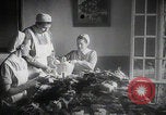 Image of Red Cross workers gift packing Germany, 1944, second 3 stock footage video 65675080821