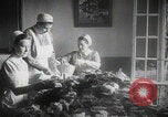 Image of Red Cross workers gift packing Germany, 1944, second 4 stock footage video 65675080821
