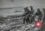 Image of American POW captured by Germans Ardennes Western Front, 1944, second 16 stock footage video 65675080824