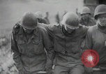 Image of American POW captured by Germans Ardennes Western Front, 1944, second 21 stock footage video 65675080824
