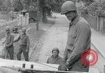 Image of US soldier climbing Delitzsch Saxony Germany, 1945, second 12 stock footage video 65675080838