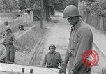 Image of US soldier climbing Delitzsch Saxony Germany, 1945, second 15 stock footage video 65675080838