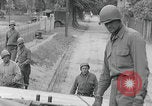 Image of US soldier climbing Delitzsch Saxony Germany, 1945, second 16 stock footage video 65675080838
