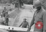 Image of US soldier climbing Delitzsch Saxony Germany, 1945, second 17 stock footage video 65675080838