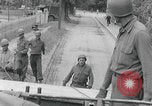 Image of US soldier climbing Delitzsch Saxony Germany, 1945, second 18 stock footage video 65675080838