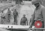 Image of US soldier climbing Delitzsch Saxony Germany, 1945, second 20 stock footage video 65675080838