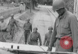 Image of US soldier climbing Delitzsch Saxony Germany, 1945, second 21 stock footage video 65675080838