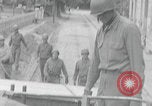 Image of US soldier climbing Delitzsch Saxony Germany, 1945, second 23 stock footage video 65675080838