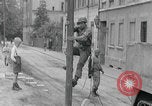 Image of US soldier climbing Delitzsch Saxony Germany, 1945, second 24 stock footage video 65675080838