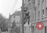 Image of US soldier climbing Delitzsch Saxony Germany, 1945, second 26 stock footage video 65675080838