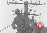 Image of US soldier climbing Delitzsch Saxony Germany, 1945, second 31 stock footage video 65675080838