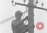 Image of US soldier climbing Delitzsch Saxony Germany, 1945, second 33 stock footage video 65675080838